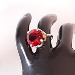 Gold Tone Ring With Big Red Round Stone On Elegant Prong Setting